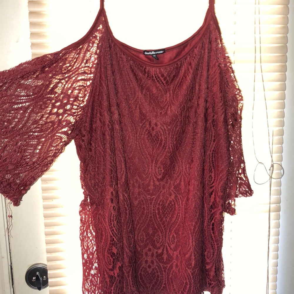Red lace off the shoulder blouse.